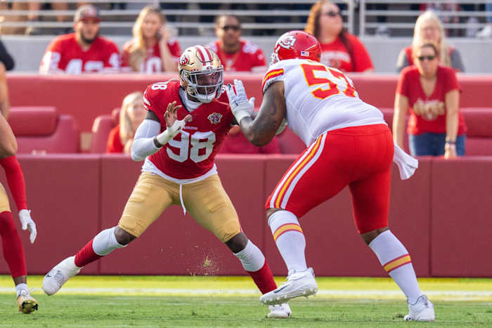 Kansas City Chiefs LT Orlando Brown Jr. blocks pass rusher